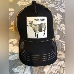 Baseball hat “the goat”.